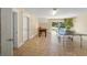 Recreation room featuring a ping pong table, foosball table, and access to the backyard at 204 66Th Street, Holmes Beach, FL 34217