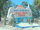 Welcome to Holmes Beach and Anna Maria Island Sign with playful marine life sculptures at 204 66Th Street, Holmes Beach, FL 34217