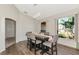 Well-lit dining room featuring modern chandelier and large windows at 2247 Otter Creek Ln, Sarasota, FL 34240