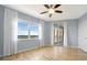Bedroom features a beautiful view, a ceiling fan and wood floors at 2625 Terra Ceia Bay Blvd # 504, Palmetto, FL 34221