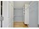 Spacious walk-in closet features custom shelving and wood floors at 2625 Terra Ceia Bay Blvd # 504, Palmetto, FL 34221