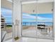 Spacious balcony with serene water views, perfect for outdoor dining and relaxation at 3010 Grand Bay Blvd # 482, Longboat Key, FL 34228