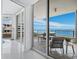 Balcony overlooking a serene water view, complete with outdoor seating, bright and airy interior at 3010 Grand Bay Blvd # 482, Longboat Key, FL 34228