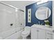 Modern bathroom with a shower/tub combo, vanity, framed mirror, and sleek fixtures at 3010 Grand Bay Blvd # 482, Longboat Key, FL 34228
