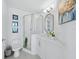 Bright, modern bathroom featuring a glass-enclosed shower and a sleek, white vanity at 3010 Grand Bay Blvd # 482, Longboat Key, FL 34228