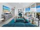 Stylish living room featuring modern decor, ocean views, and an open layout at 3010 Grand Bay Blvd # 482, Longboat Key, FL 34228