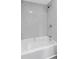 Bathroom features gray tiled shower surround and tub at 3457 50Th N Ave, St Petersburg, FL 33714