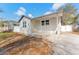 Charming single-story home with a covered front porch and freshly painted exterior at 3457 50Th N Ave, St Petersburg, FL 33714