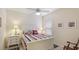 A cozy bedroom featuring a nautical-themed bedspread and a quaint white nightstand at 3839 Autumn Fern Ter, Sarasota, FL 34243