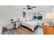 Comfortable bedroom with light wood floors, recessed lighting, ceiling fan, and natural light at 4414 Turnberry Ct, Bradenton, FL 34210