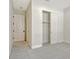 Bedroom featuring plush carpet and a closet with sliding doors at 552 Bocelli Dr, North Venice, FL 34275