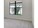 Bedroom featuring plush carpet and a view of a tree at 552 Bocelli Dr, North Venice, FL 34275