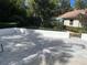Backyard patio featuring a large paver section, as well as a retaining wall at 5708 Garden Lakes Fern, Bradenton, FL 34203