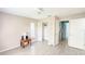Neutral bedroom with a ceiling fan, closet, and tile flooring at 5708 Garden Lakes Fern, Bradenton, FL 34203