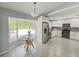 Cozy breakfast nook featuring a bay window and stainless steel appliances at 5708 Garden Lakes Fern, Bradenton, FL 34203