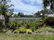 Welcoming Garden Lakes community sign surrounded by lush landscaping and greenery at 5708 Garden Lakes Fern, Bradenton, FL 34203