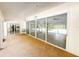 The sunroom offers a tranquil view of the outdoors and has carpeted floors at 5708 Garden Lakes Fern, Bradenton, FL 34203