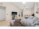 Comfortable living room features a neutral color palette, wood floors, and lots of natural light at 5727 Monte Rosso Rd, Sarasota, FL 34243