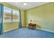 Bedroom with a ceiling fan and large window at 5750 Saddle Oak Trl, Sarasota, FL 34241