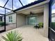 Enjoy outdoor living on this screened patio with ceiling fan at 7108 Playa Bella Dr, Bradenton, FL 34209