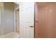 This is a full bathroom with a walk-in shower that is newly remodeled with pink tile at 8503 Gateway Ct, Englewood, FL 34224