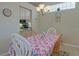 Charming dining area adjacent to the kitchen, featuring a decorative chandelier at 8503 Gateway Ct, Englewood, FL 34224