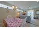 Open-concept dining area with stylish furnishings and view to the cozy living room at 8503 Gateway Ct, Englewood, FL 34224
