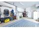 This is an organized garage with washer, dryer, and plenty of storage for equipment at 8503 Gateway Ct, Englewood, FL 34224