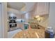 Modern kitchen with stainless steel appliances and granite countertops at 8503 Gateway Ct, Englewood, FL 34224