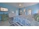 Spacious main bedroom with ceiling fan and large windows provides ample natural light and storage at 8503 Gateway Ct, Englewood, FL 34224