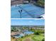 Aerial view of well-maintained blue tennis courts in a residential community at 8503 Gateway Ct, Englewood, FL 34224
