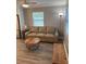 Living area features new floors, natural light, and neutral paint at 1041 S Tuttle Ave, Sarasota, FL 34237