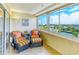 Relaxing balcony with comfortable seating and scenic views of the surrounding landscape at 1125 W Peppertree Dr # 706, Sarasota, FL 34242