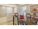 Cozy dining area featuring a modern table set, with stylish décor and tile flooring at 1125 W Peppertree Dr # 706, Sarasota, FL 34242