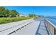 Dock seating offers a relaxing waterfront view of the community's waterway at 1125 W Peppertree Dr # 706, Sarasota, FL 34242