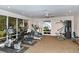 Spacious fitness center featuring modern exercise equipment and natural light from large windows at 1125 W Peppertree Dr # 706, Sarasota, FL 34242