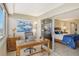 Bright office space with scenic views, a work desk, and leads into a bedroom at 1125 W Peppertree Dr # 706, Sarasota, FL 34242