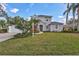 Charming two-story home with manicured lawn and lush landscaping at 11254 Rivers Bluff Cir, Lakewood Ranch, FL 34202