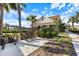 Clubhouse exterior features bike racks and tropical landscaping at 12518 Oak Hill Way, Parrish, FL 34219