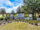 A beautifully landscaped Crosswind Point community entrance sign welcomes residents and guests at 12518 Oak Hill Way, Parrish, FL 34219