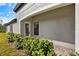 Exterior of the house with garden landscaping at 12518 Oak Hill Way, Parrish, FL 34219