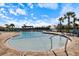 Community pool has shallow access, lounge seating, and a fountain in the background at 12518 Oak Hill Way, Parrish, FL 34219
