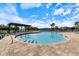 Community pool features a zero entry access point and lounge seating around the pool at 12518 Oak Hill Way, Parrish, FL 34219
