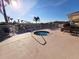 Inviting community hot tub with surrounding seating, offering a relaxing and enjoyable experience at 13602 Abercrombie Dr, Englewood, FL 34223