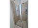 Modern tiled shower with sleek glass door and shower head in bathroom showcasing new design at 13602 Abercrombie Dr, Englewood, FL 34223