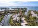 Waterfront community featuring a boat dock, lush landscaping and serene canal views at 1531 Clower Creek Dr # Ha245, Sarasota, FL 34231