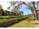 Expansive backyard featuring lush greenery, scenic views, and serene landscaping at 1531 Clower Creek Dr # Ha245, Sarasota, FL 34231