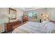 Comfortable bedroom featuring a serene ambiance, natural light, and ample storage at 17026 Loudon Pl, Bradenton, FL 34202
