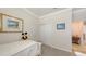 Neutral toned bedroom with carpet, crown moulding, closet, and views to hallway at 17026 Loudon Pl, Bradenton, FL 34202