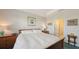 Bright bedroom featuring a comfortable bed, soft lighting, and a relaxing atmosphere at 17026 Loudon Pl, Bradenton, FL 34202